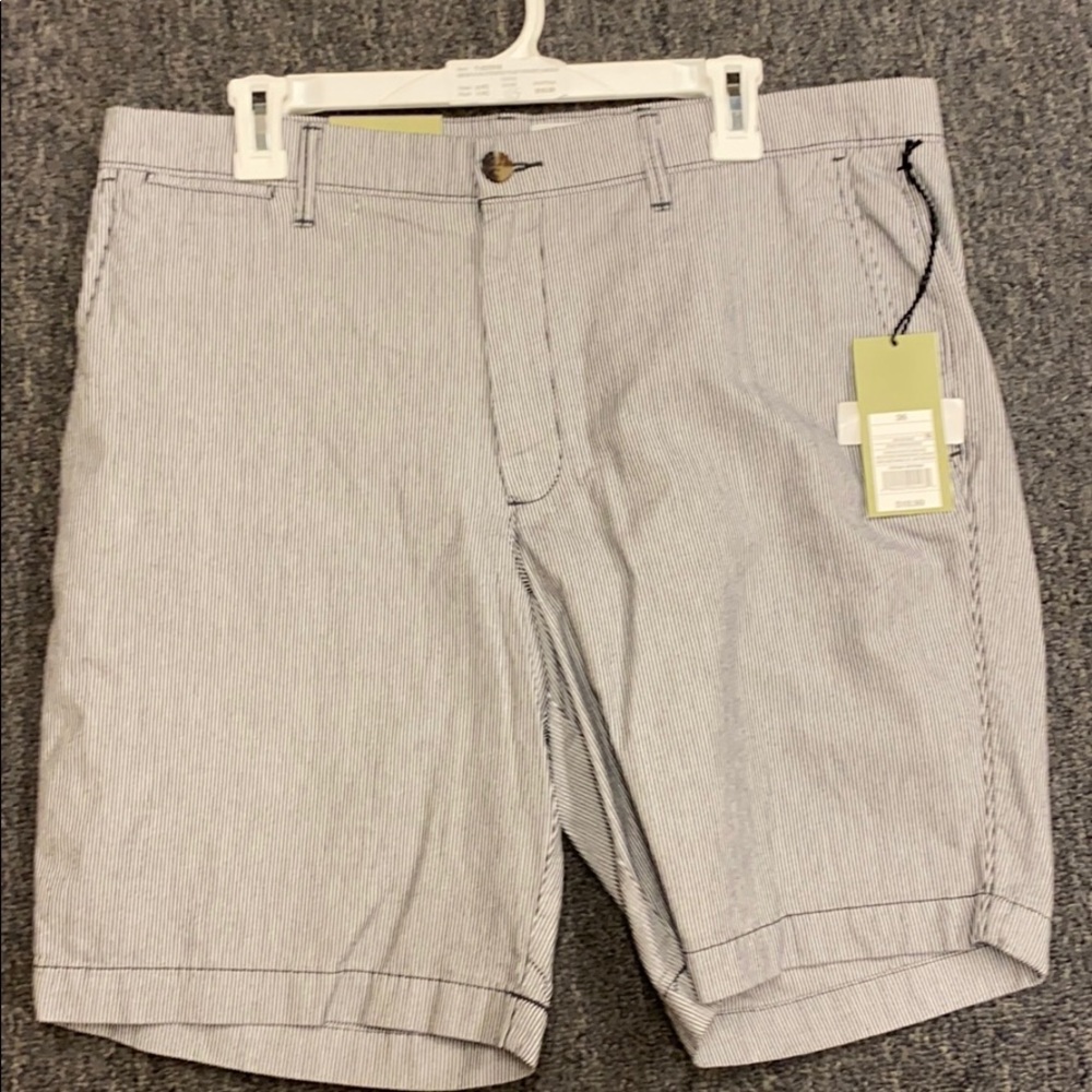 9” FLAT FRONT SHORTS.